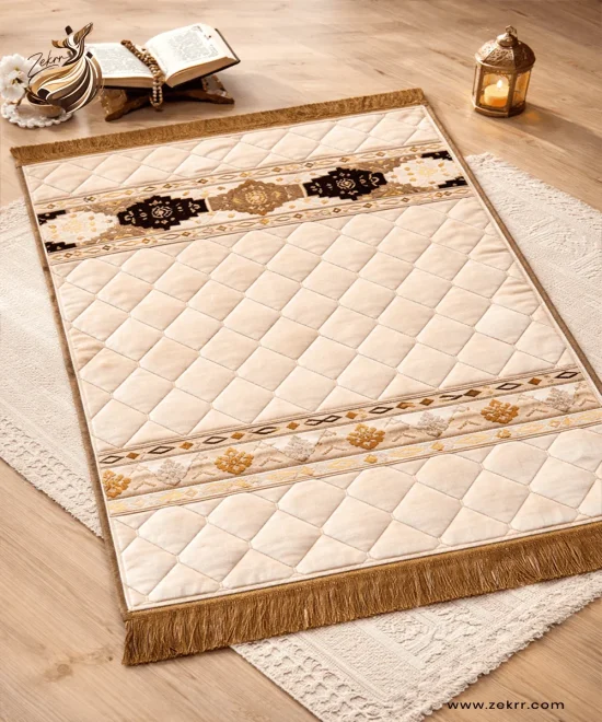 Beige luxury velvet prayer mat with embroidered Islamic patterns and soft cushioning by ZEKRR