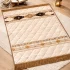 Beige luxury velvet prayer mat with embroidered Islamic patterns and soft cushioning by ZEKRR